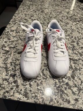 Nike women’s White Sneakers with Red Swoosh